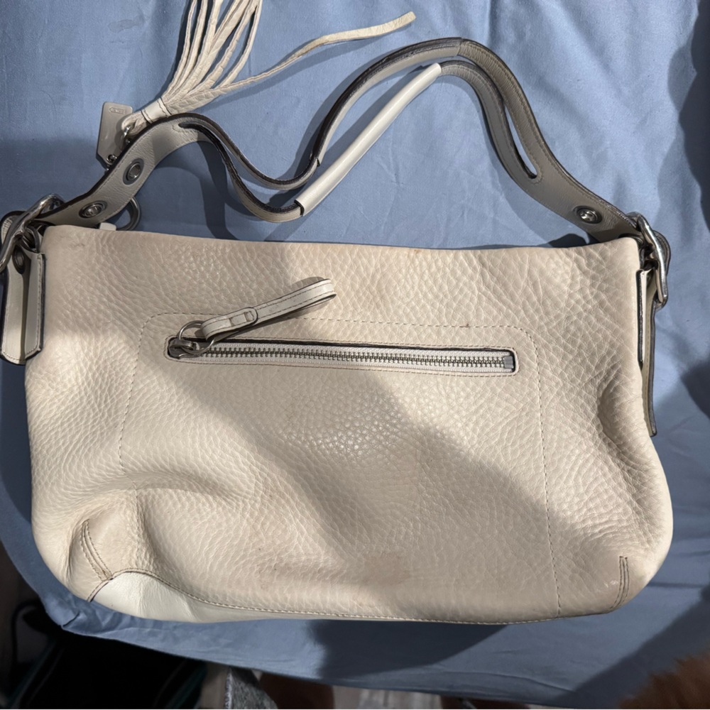 Cream coach shoulder